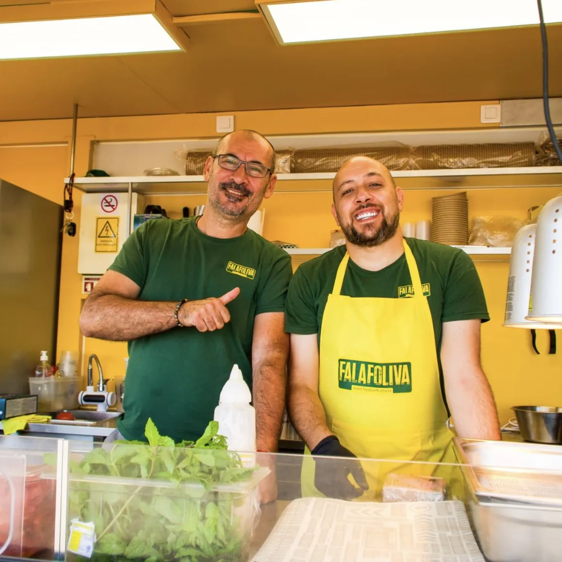 The Falafoliva team inside the truck